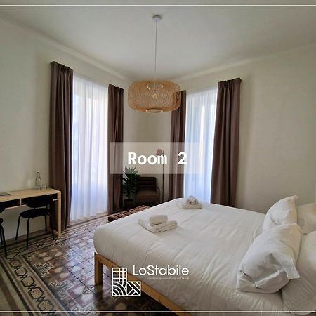Lostabile Guesthouse & Coworking Барі Екстер'єр фото